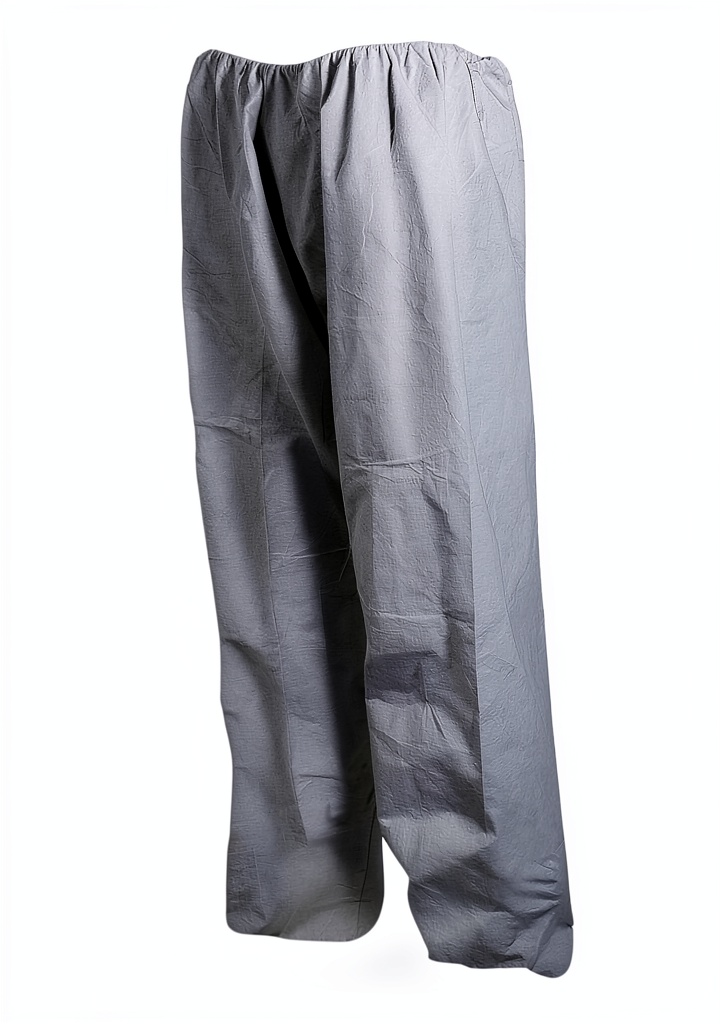 MAGID Disposable Pants Large White being worn on a construction site with tools in pockets